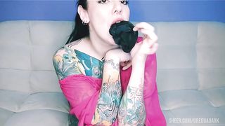 Tattooed hottie with a big ass takes her panties in her mouth and slaps her fucking ass